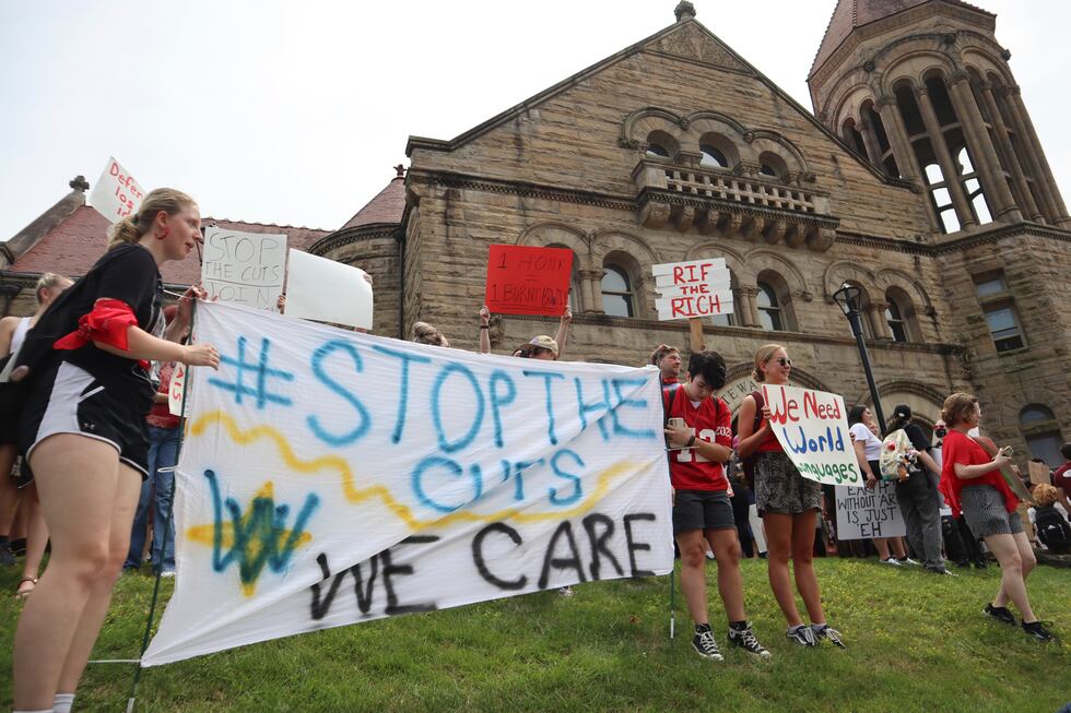 FILE - West Virginia University students lead a protest against cuts to programs in world...