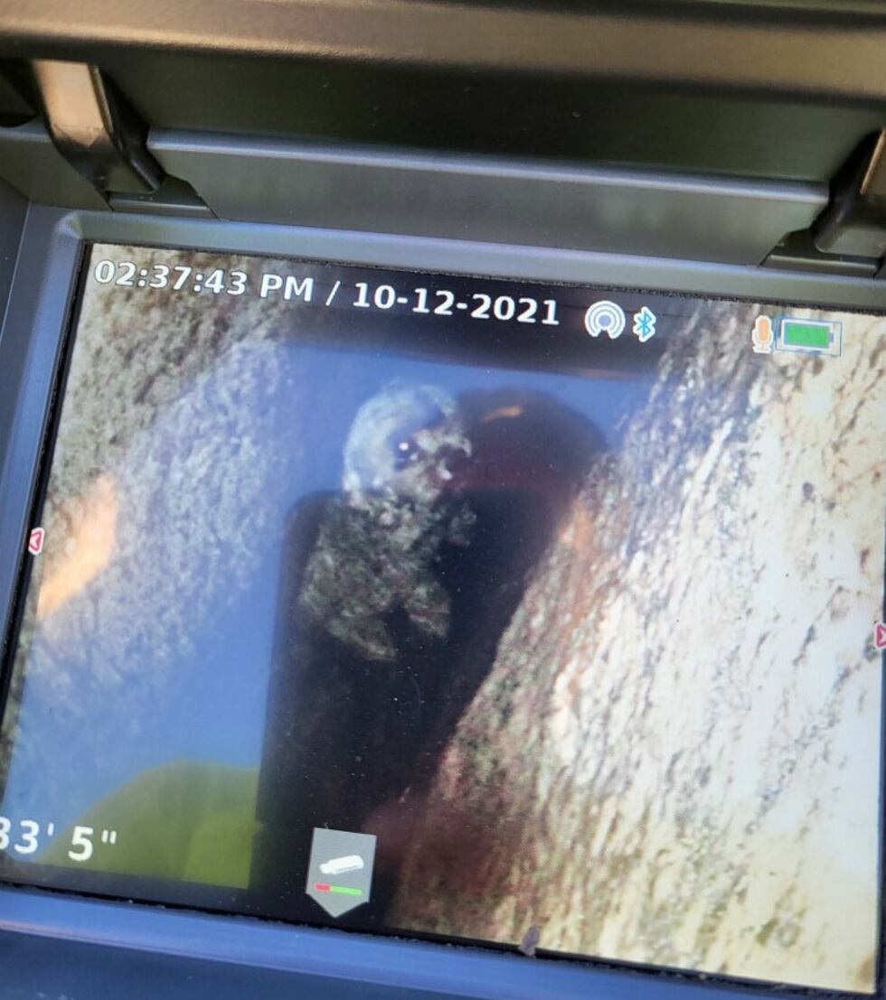 A specialized plumbing camera observes 12-year-old Liza in the rock crevice she fell in on...