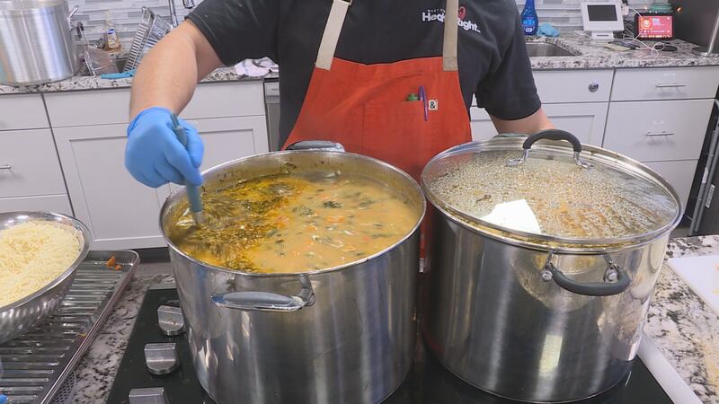 Volunteers preparing soup for community.