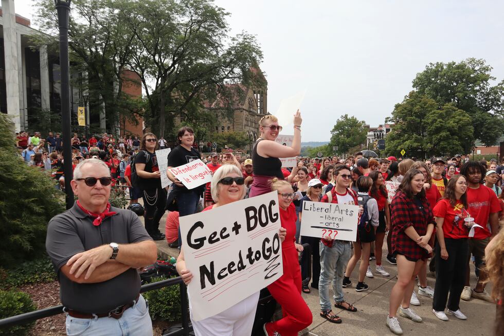 FILE - West Virginia University students, faculty and community members attend a protest...